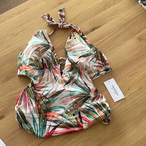 Tropical Paradise one-piece halter. Never worn, tags + hygiene sticker attached